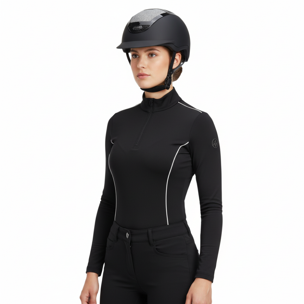 Ucaco Celestia Luxe Riding Helmet worn by a rider in black outfit, showcasing elegance and safety.