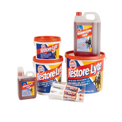 A collection of Restore-Lyte product packaging in various sizes, featuring the brand logo, product name, and images of horses. The packaging is primarily red and white with additional orange and yellow accents.
