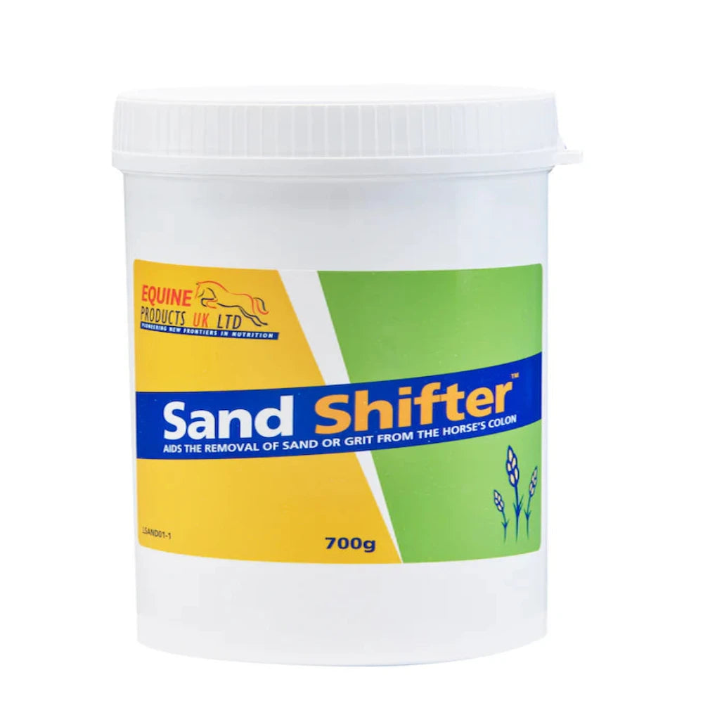 A white plastic container of Sand Shifter, a product designed for horses to remove sand and soil from their guts, with a label indicating 700g weight and an image of a horse.