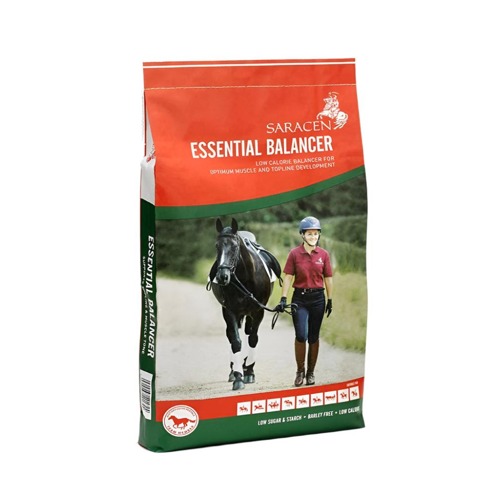 A bag of Saracen Essential Balancer horse feed with a picture of a person riding a horse in the background.