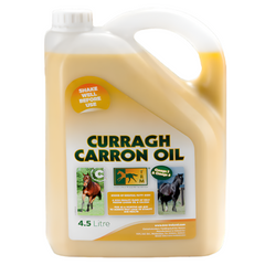 Jug of Curragh Carron Oil with label on a white background