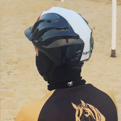 A1F Adventure Riding Mask worn by a rider with a helmet in a sandy equestrian setting.