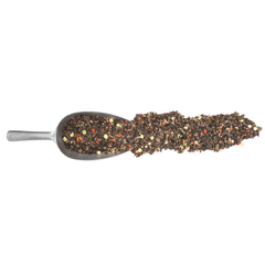 Spoon filled with a blend of herbs and spices promoting natural health for horses, featuring PUR.MASH.
