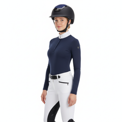 Ucaco Celestia Luxe Riding Helmet worn by a rider in stylish equestrian attire, showcasing luxury and safety.