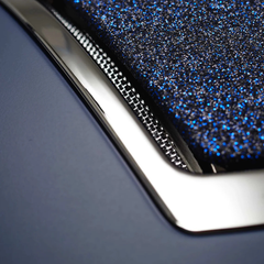 Close-up view of the Alzarrab PE Odyssey Horse Riding Helmet with a glossy edge and sparkly blue texture.