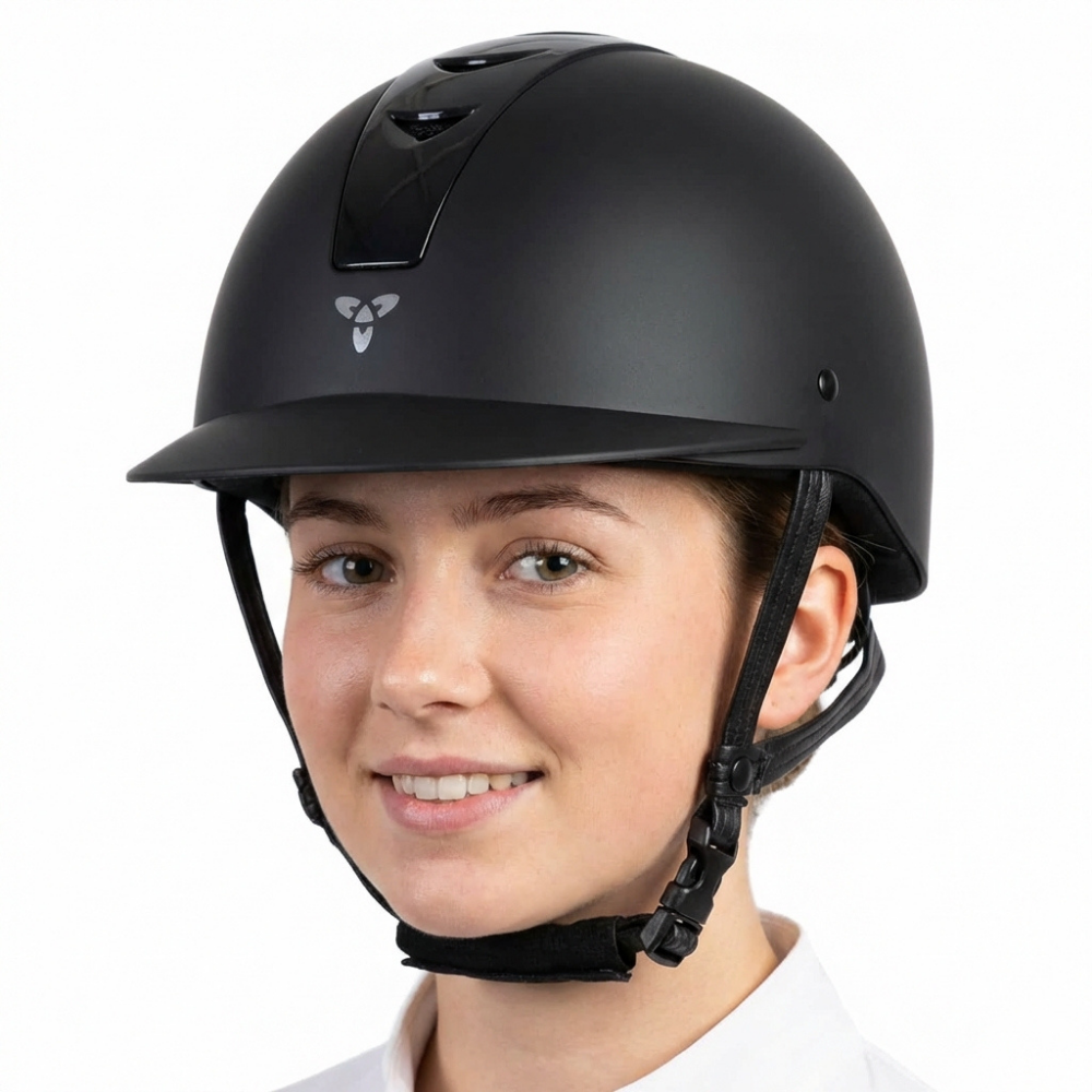 Ucaco Dora Premium Riding Helmet worn by a smiling rider, showcasing sporty design and safety features.